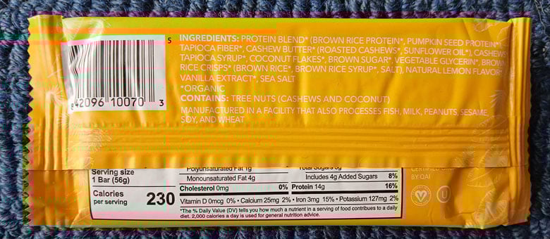 Back of Aloha protein bar label showing white text on yellow background.